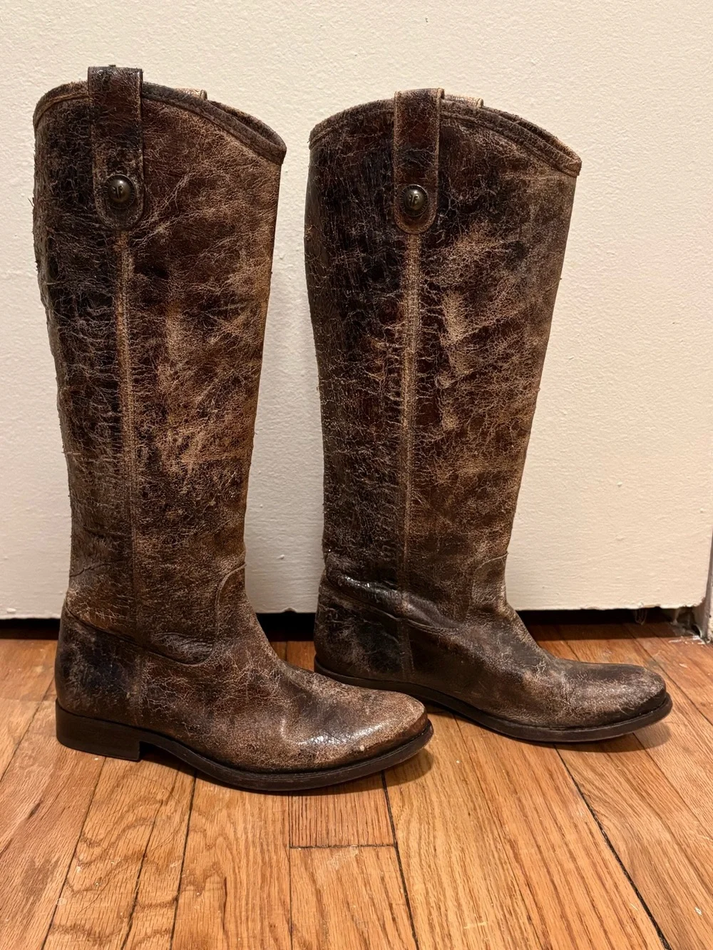 Frye brown leather knee-high boots with distressed texture